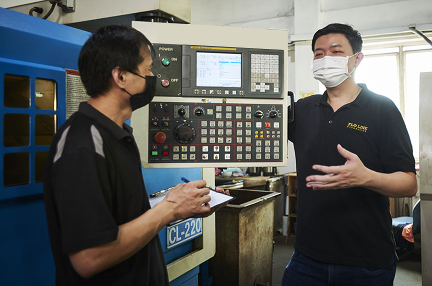 Ho Guo Liang (right), the Co-ordinating Engineer of Flo-Line Hydraulics' digital transformation