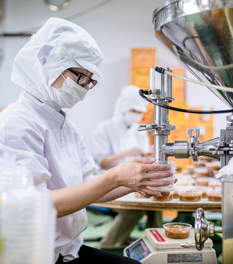 Workers preparing food using modern agri-food technology