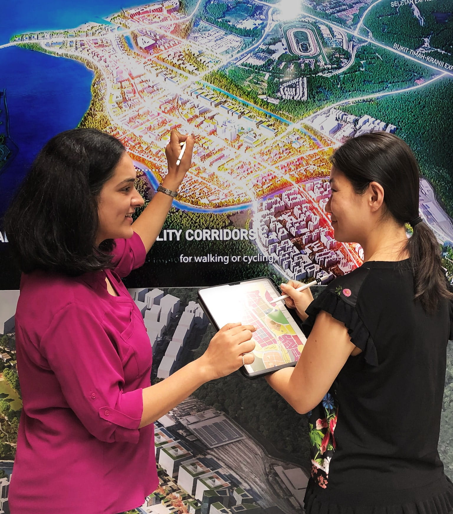 An architect and a planner discussing estate rejuvenation that focuses on sustainability